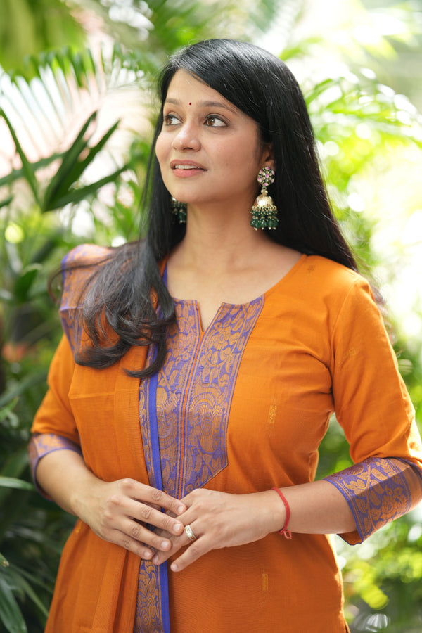 🌸Kanchi Glow – Radiant Orange Elegance