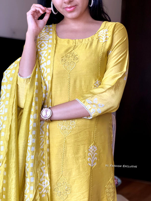 Yellow batik self embroidery suits